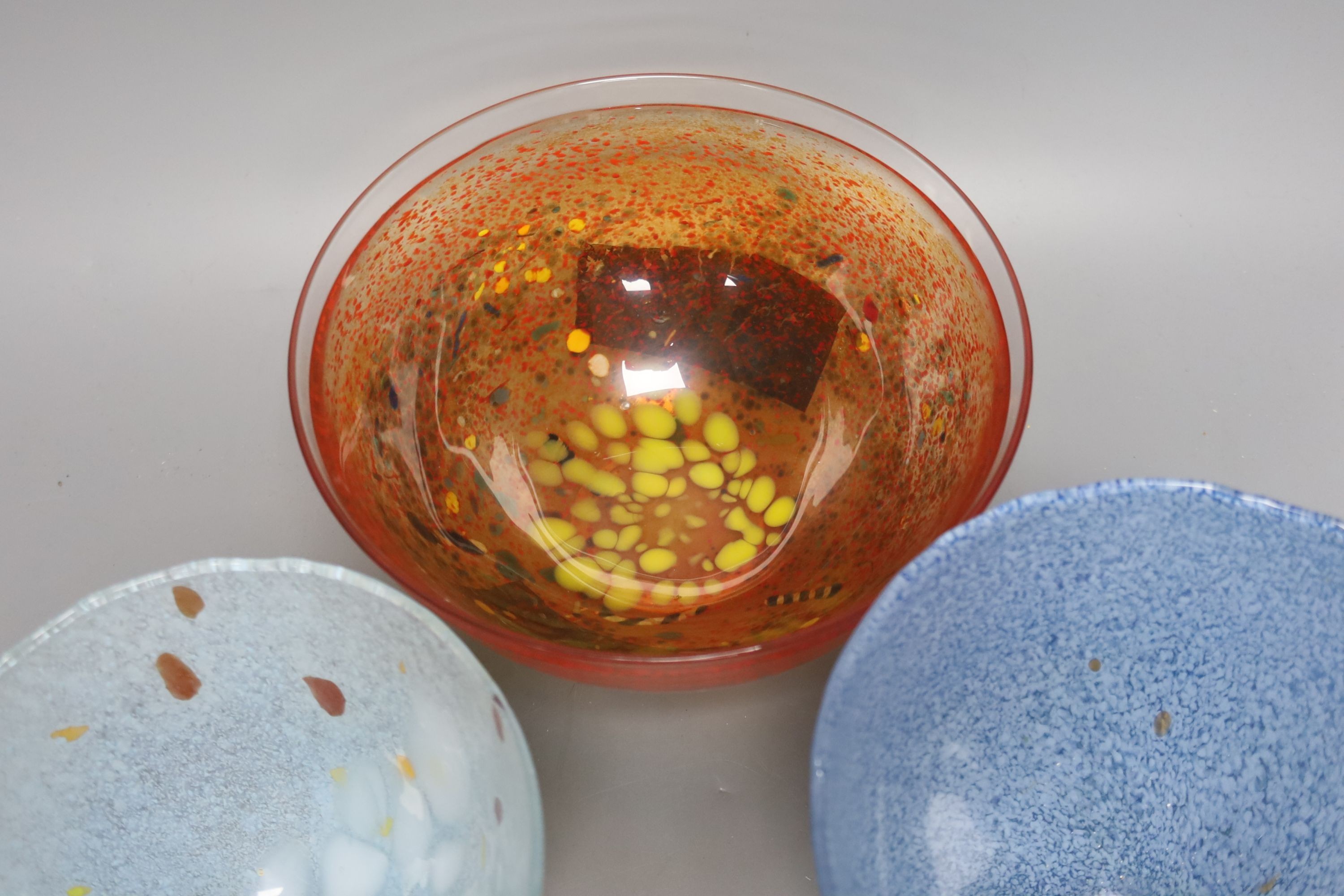 Three Kosta Boda art glass bowls, signed, diameter 21cm